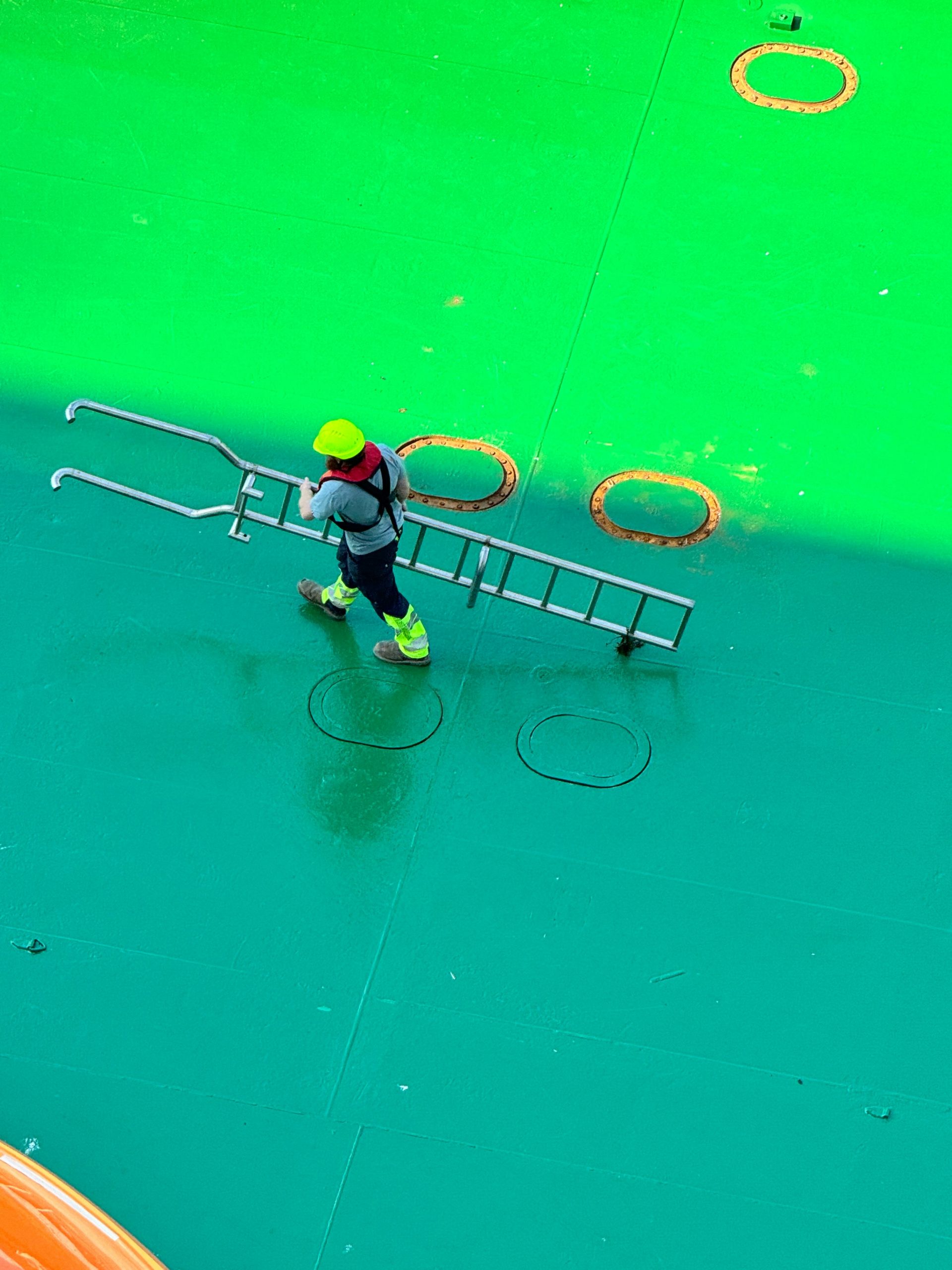 Fluorescein dye turning water green in a drain inspection context