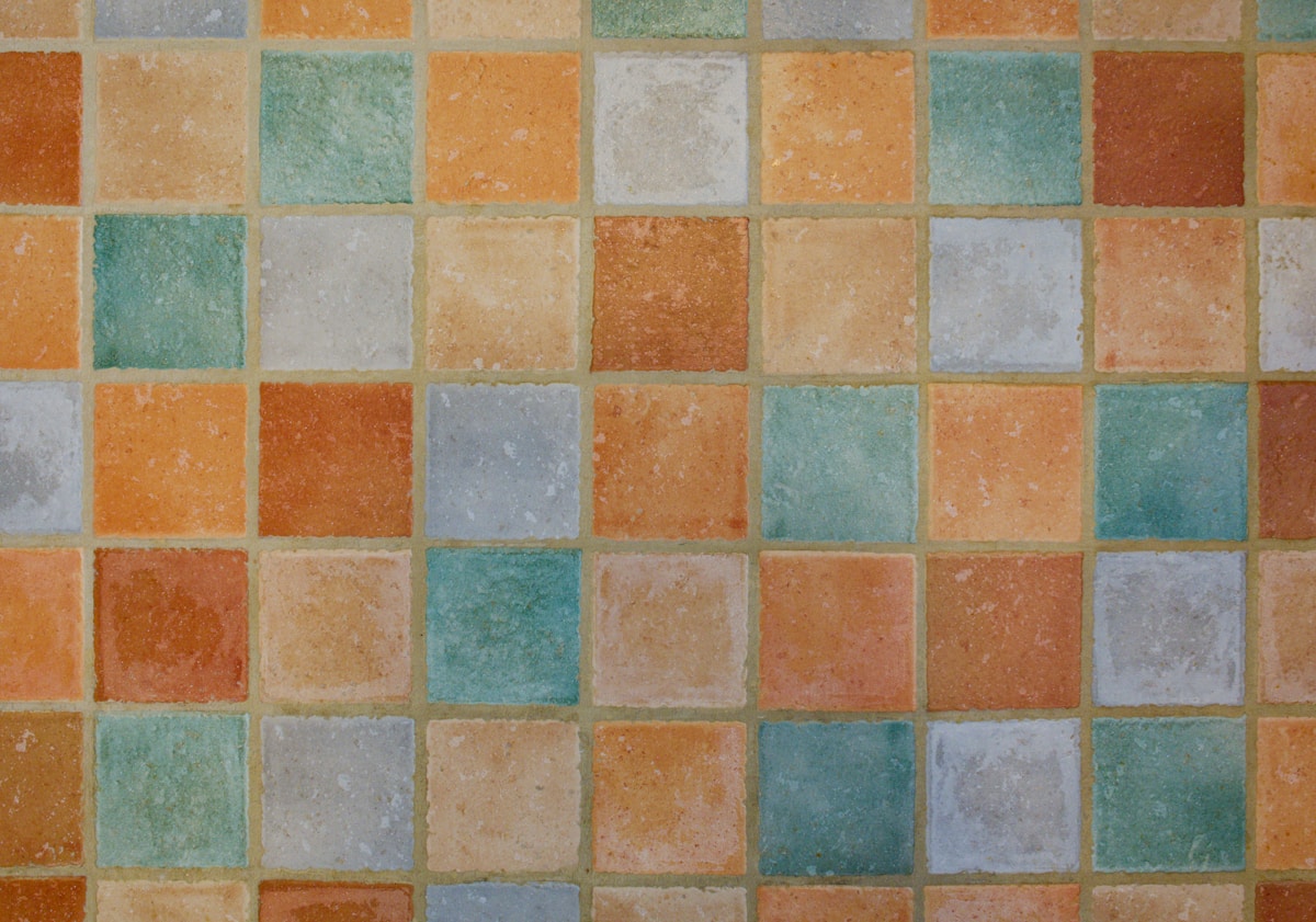 Colorful square tiles arranged in a grid pattern.