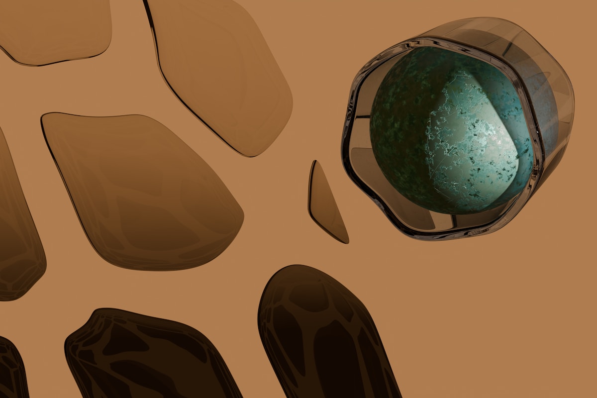 A picture of a set of foot pads and a ball