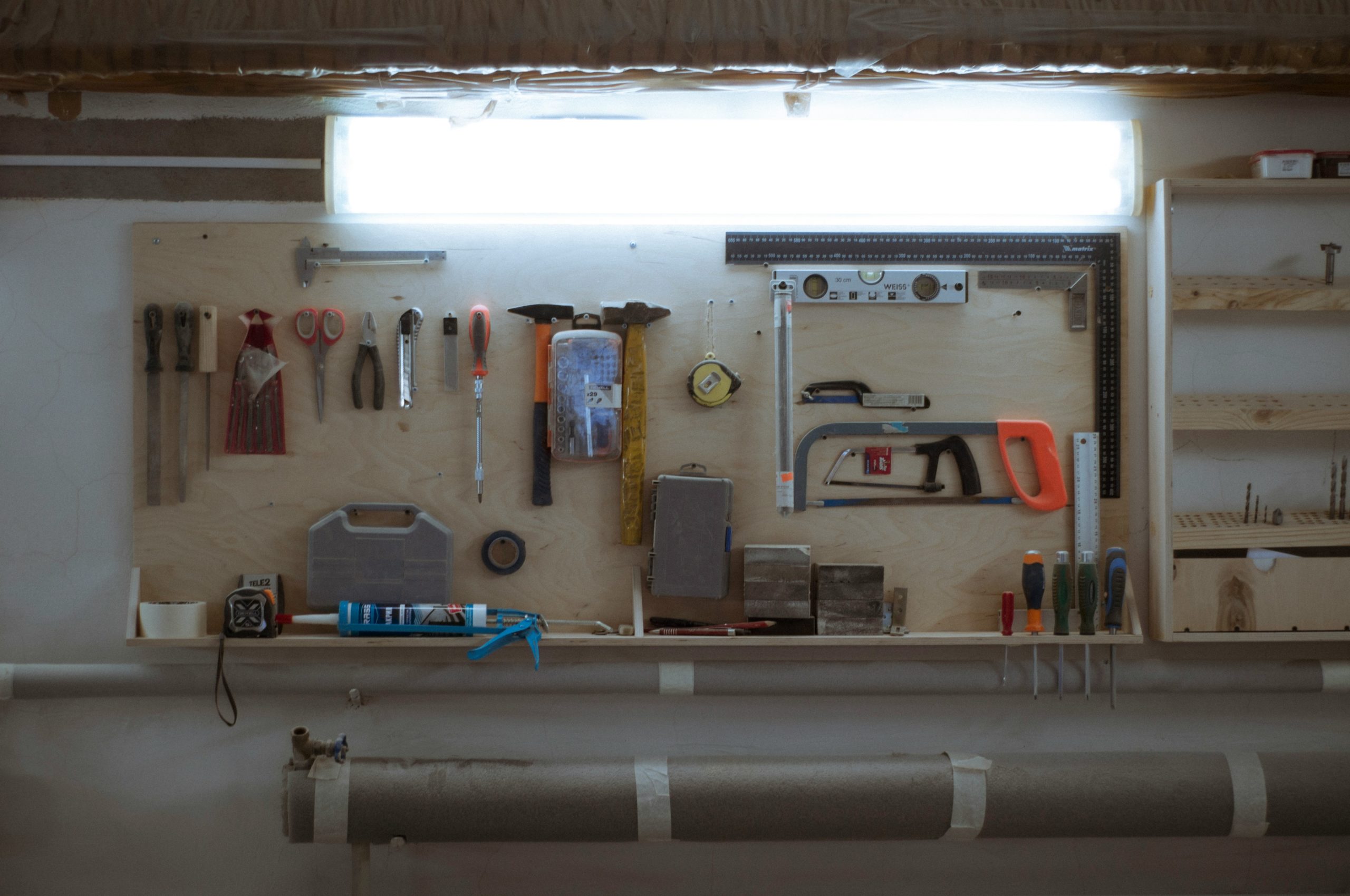 Unsplash image of a serious toolbox and professional plumbing equipment